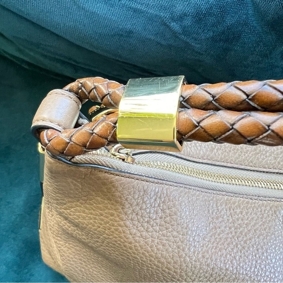 MICHAEL KORS COLLECTION
Skorpios Desert Tan Pebbled Leather Hobo
Bag $79… - Picture 3 of 16